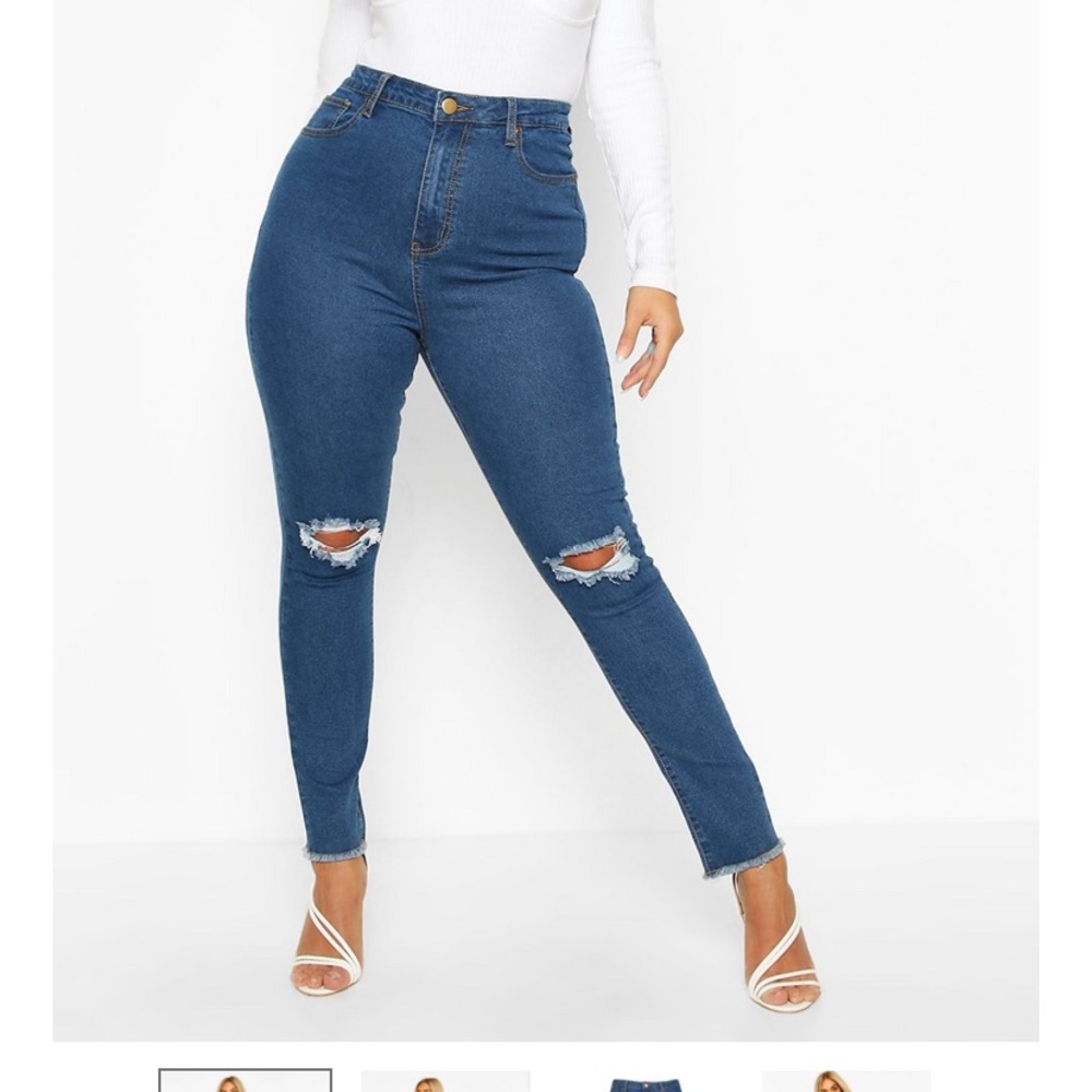 New blue knee ripped jeans